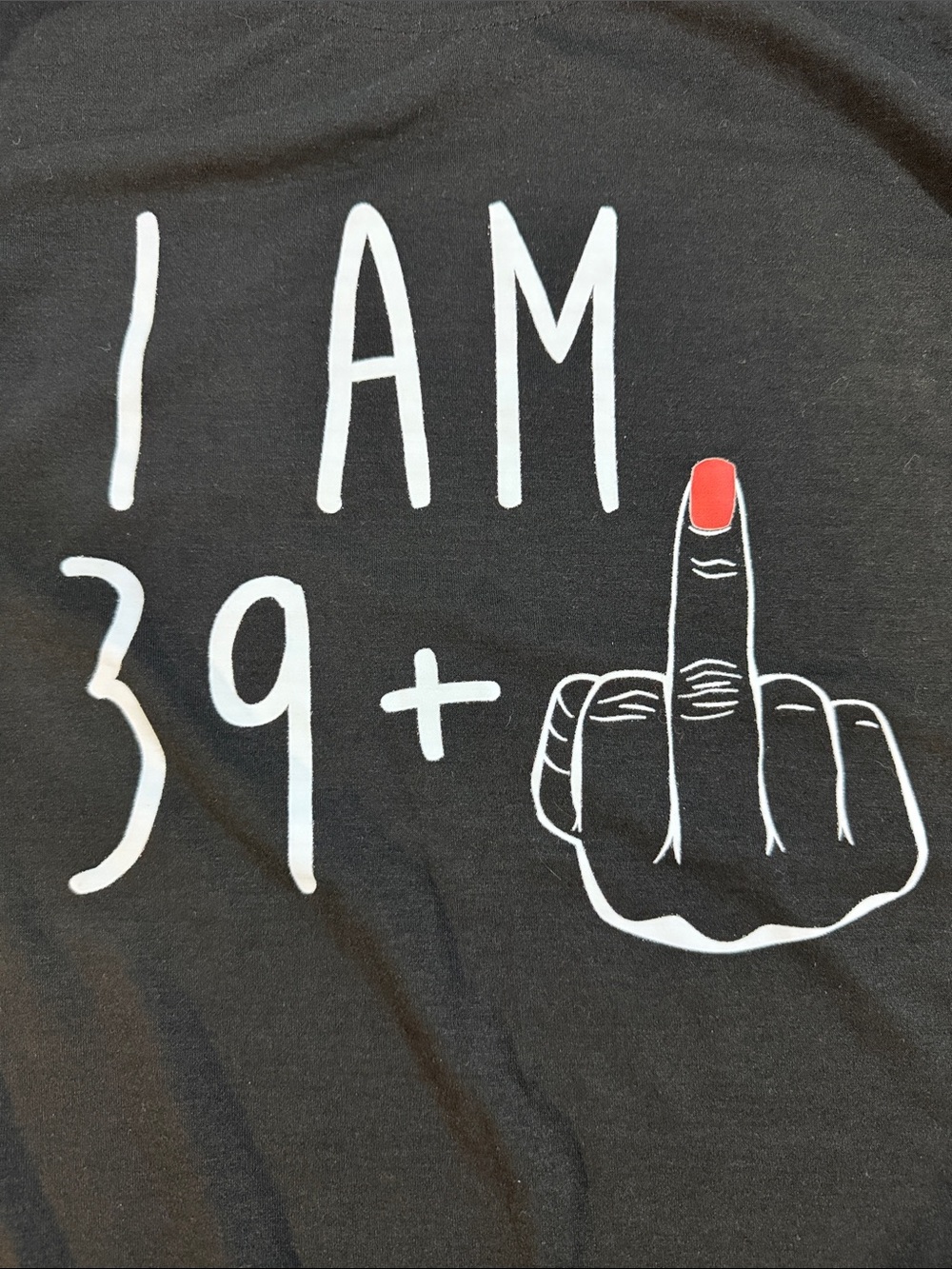I AM 39+ Graphic Tee with Red Nail Accent